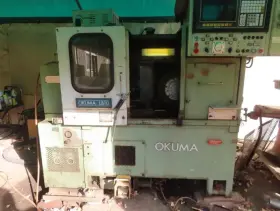 12-station Okuma Lb-10 1987 Cnc Lathe Osp5000l-g Turret 6000 Rpm Parts Catcher