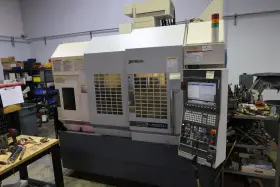 M560-v Okuma Genos