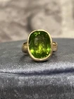 Douglas Elliott Peridot Heavy 18K Yellow Gold Ring Size 5.25 Pre-owned. Price: $3500.00.