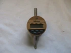 Used Mititoyo Digital Digimatic Indicator IDC-112T With Measuring Probe. Price: $38.00.