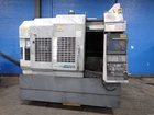 Okuma Corporation Genos M560-V Cnc Vmc 22" X 51" 02260380003 Used. Price: $34498.85.