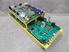 Used Fanuc A06B-6064-H322#H550 Spindle Servo Amplifier Unit A16B-2201-0440/04B. Price: $1750.00.