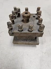 Square 4 Way Lathe Turret Tool Post Used. Price: $110.00.