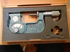 Mitutoyo 510-106 Dial Indicating Micrometer, 1-2" Range, 0.0001" Used. Price: $250.00.