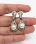 Nyjewel Vintage 18K White Gold 8.8MM Pearl & 42 Diamond Omega Back Earrings Pre-owned. Price: $2699.00.