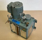 Showa Lubricator Lube Tank YMAS-6 P/n 5 2L W/ 3PH Induction Motor 200/220V 4POLE Used. Price: $150.00.